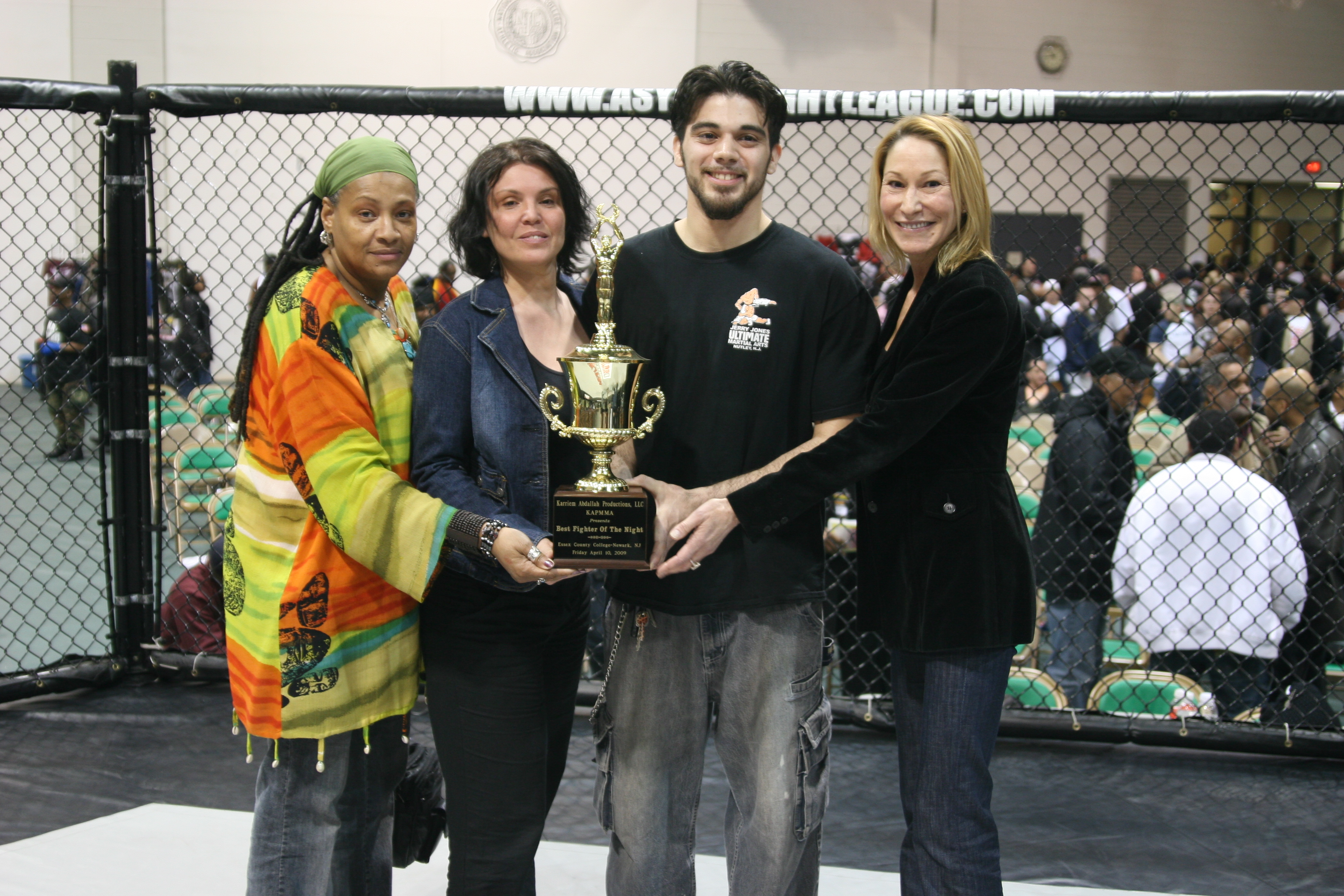 Mike Alfaro with trophy fighter of the night April 10,2009 KAPMMA