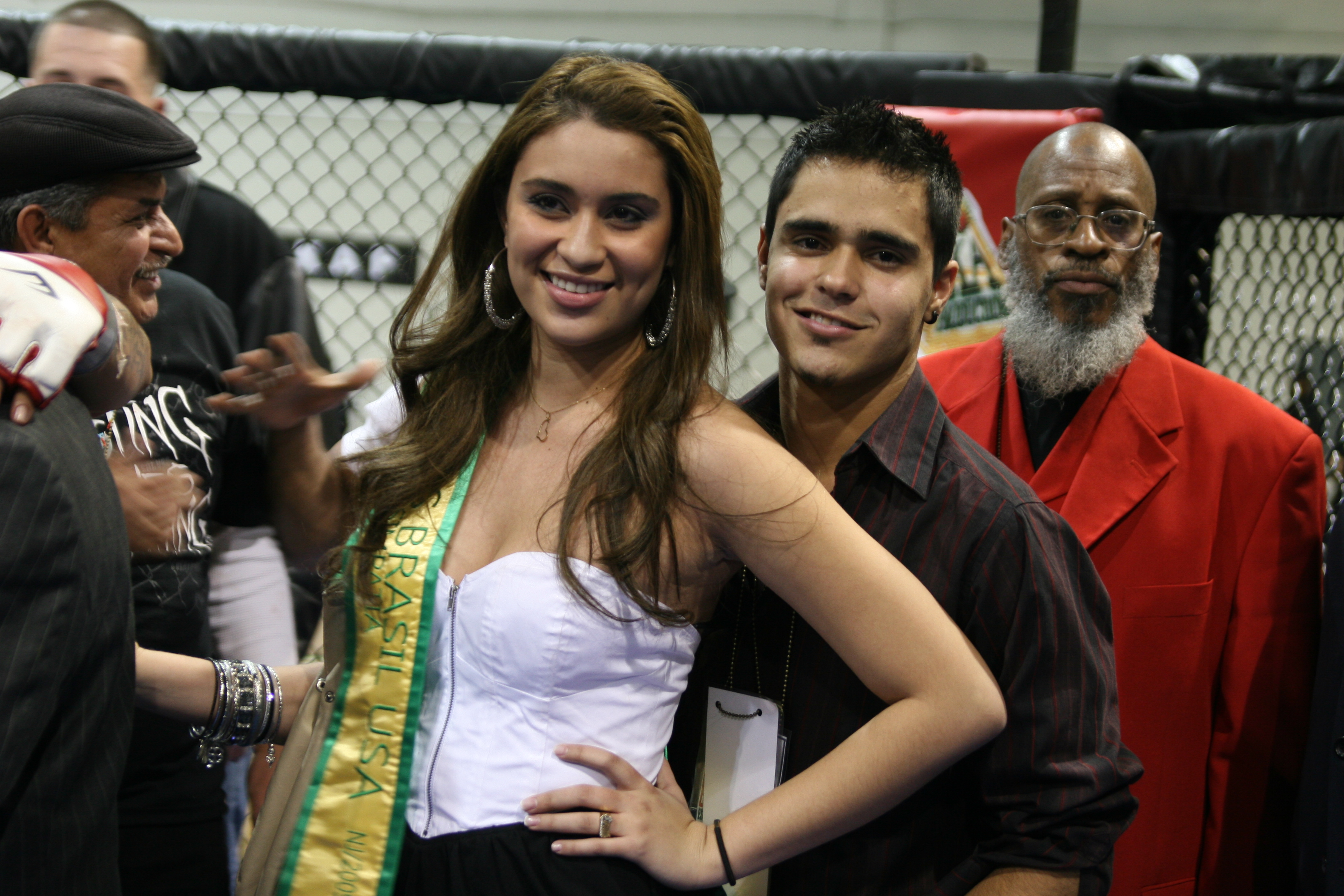 Sarah Ramos(Miss Brazil USA runner up with Michael Lima next to her, in rear Chief Deputy Athletic Commssioner of Pennsylvania Sayfullaah Al-Amriykiy.